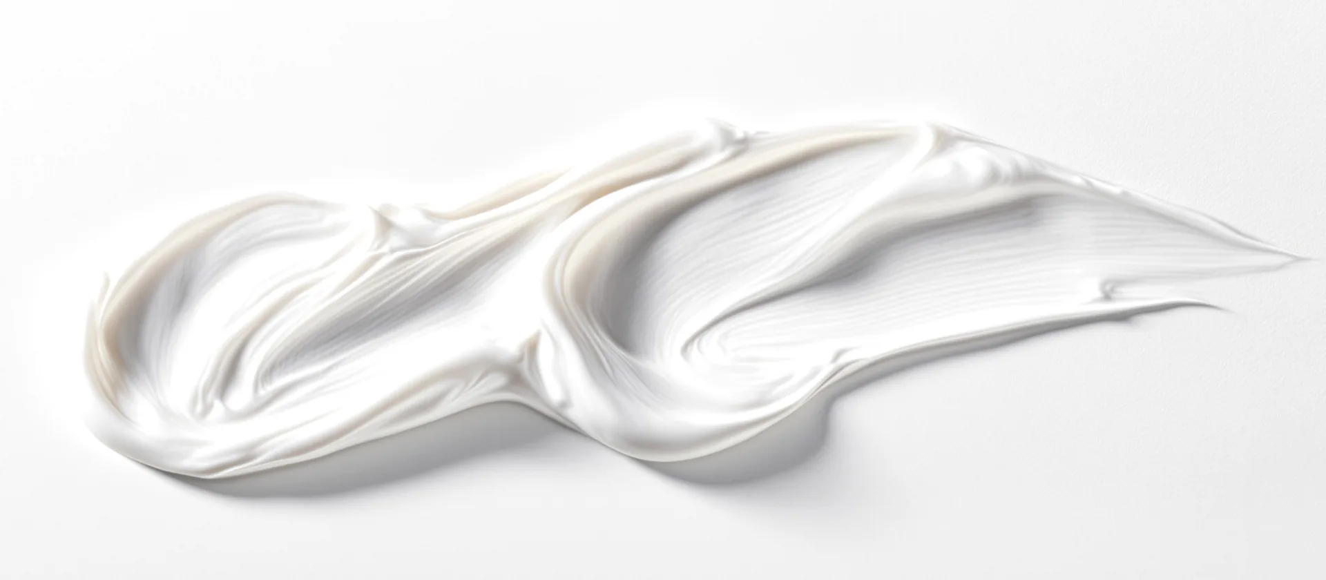 Macro texture of a white face cream — private label skin care manufacturing at Dora Kozmetik